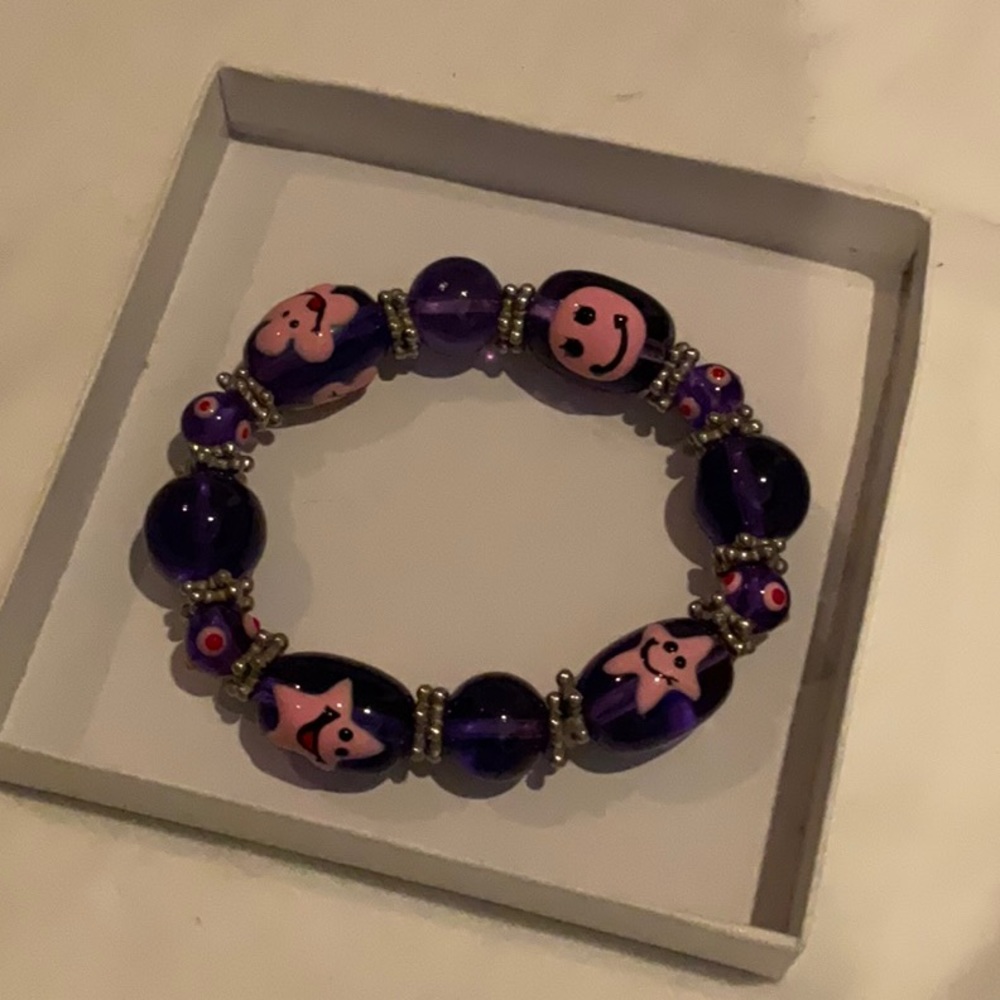 Purple & pink happy face stretch bracelet